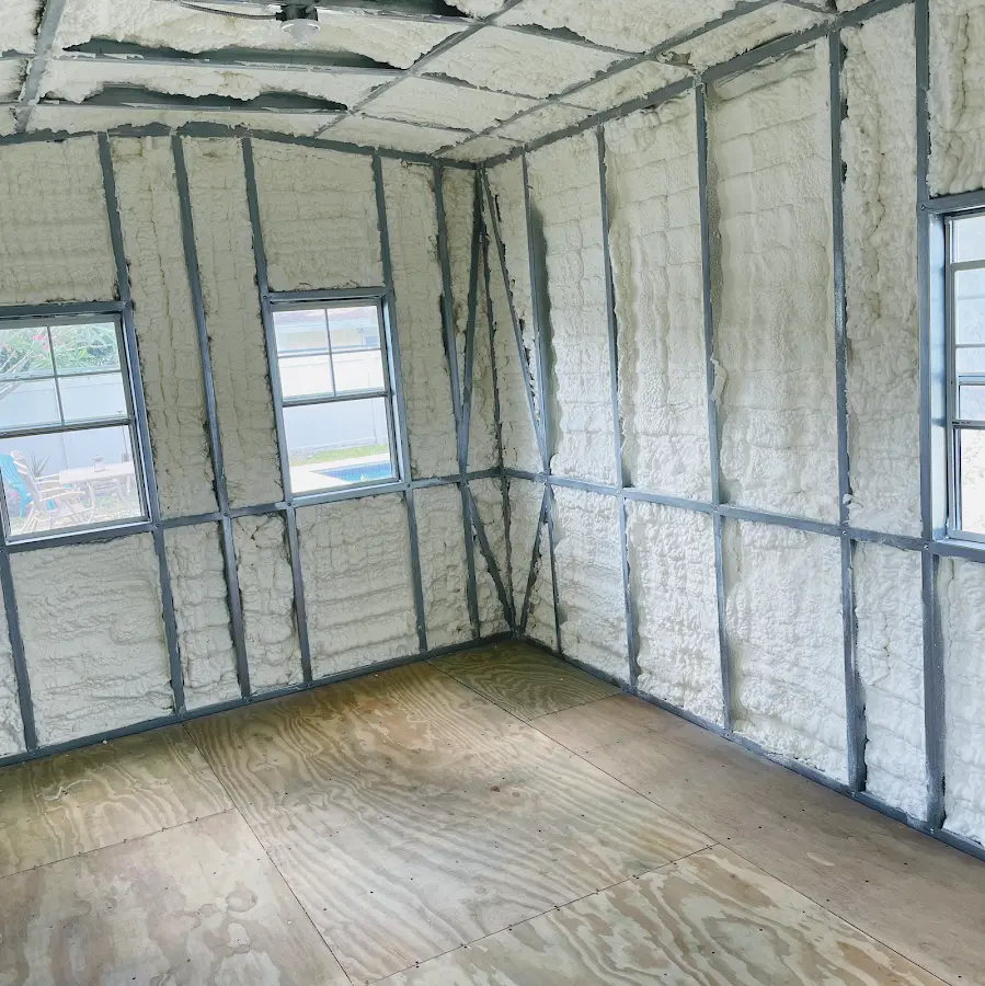 Closed-cell spray foam insulation applied to wall cavities in a residential project in Waite Park
